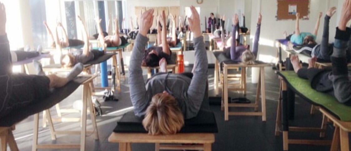 Christine De Bellefeuille Oakville Christine De Bellefeuille guiding a client through a mobility exercise in Oakville